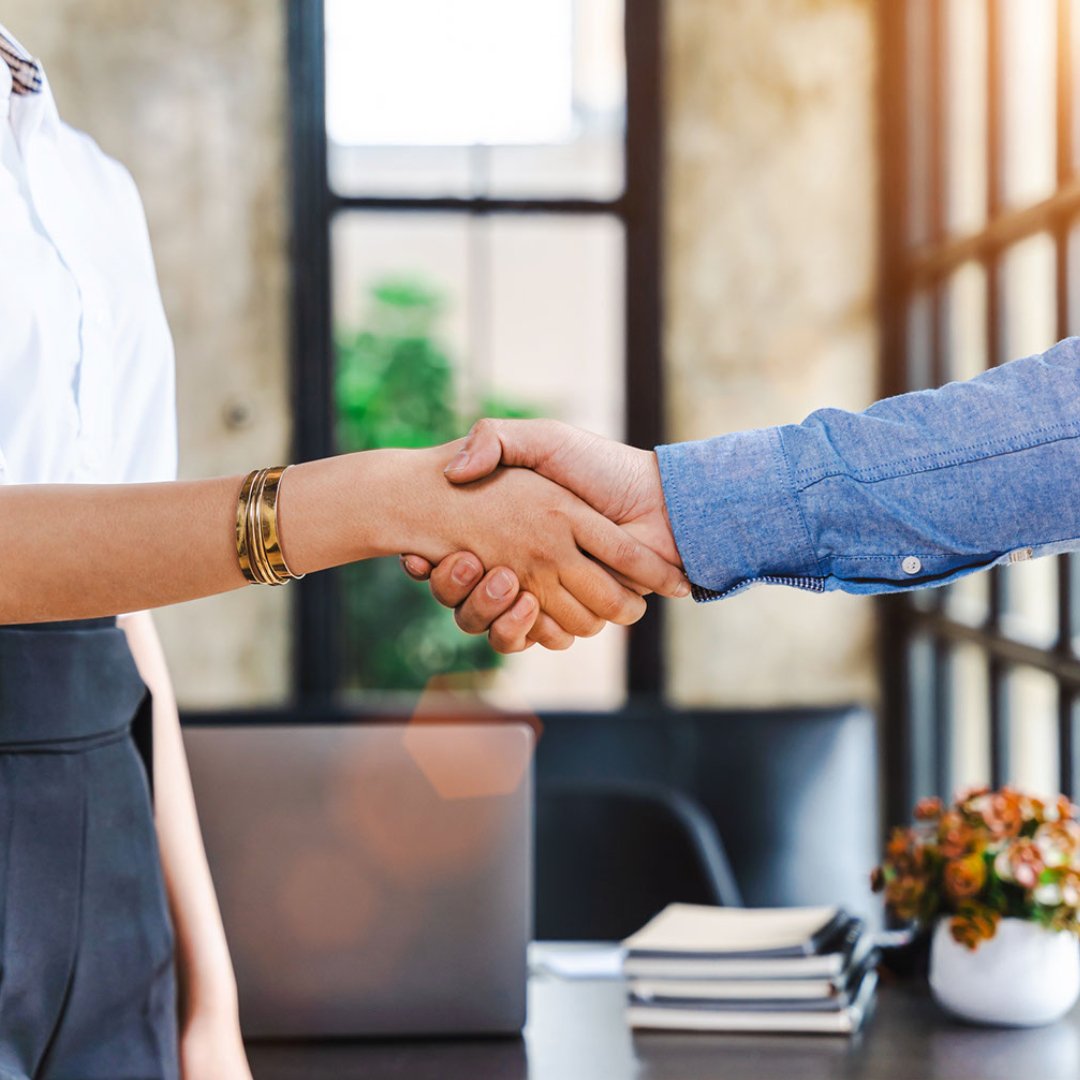 Business people shaking hands