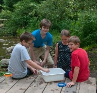 Photo of children studying outdoors