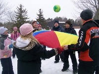 Photo of children playing games in the snow