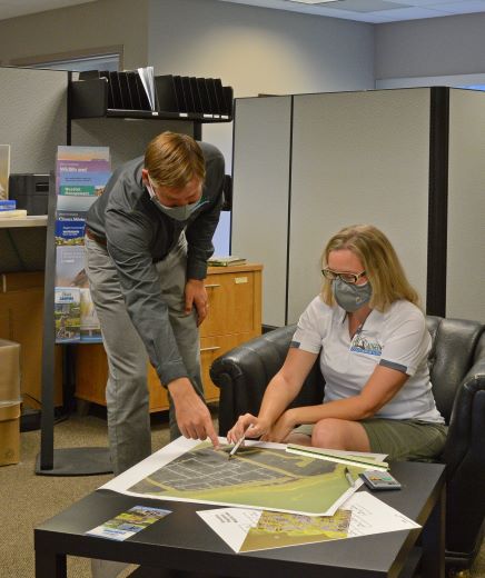 Staff looking at files