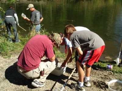 Students working near water